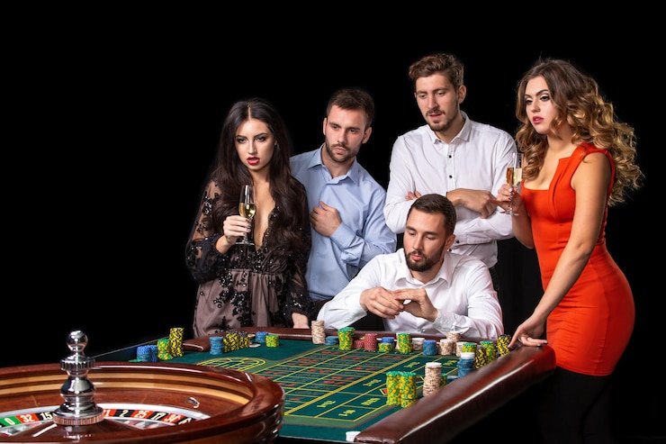 Live Baccarat dealer and card table on tuantogel login mobile screen